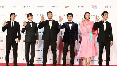 Director Bong Joon-young, actor Kim Do-yoon, Jang Jin-hee, Park Sung-joon, Kim Seung-hyun and Park Sung-il arrive for the Opening Ceremony. Getty Images