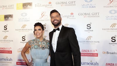 Eva Longoria and Ricky Martin walk the red carpet at the Global Gift gala in Dubai. Jeffrey E Biteng / The National