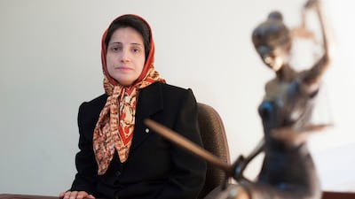 Iranian human rights lawyer Nasrin Sotoudeh in 2008 poses for a photograph in her office in Tehran, Iran. AP