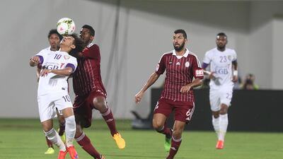 Omar Abdulrahman, left, attempts to control the ball during Al Ain's goalless draw against Al Wahda on April 27, 2015, in Abu Dhabi. Delores Johnson / The National
