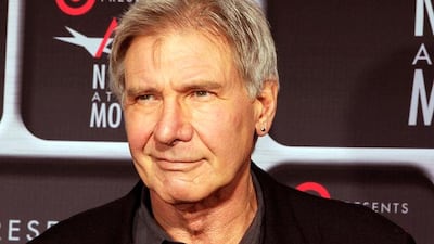 Actor Harrison Ford poses as he arrives at Target Presents AFI Night at the Movies in Hollywood April 24, 2013. The event for fans celebrates classic films and Ford introduced his film "Blade Runner: The Final Cut." REUTERS/Fred Prouser (UNITED STATES - Tags: ENTERTAINMENT)