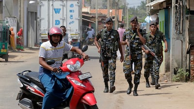 Sri Lankan air force soldiers patrol a Muslim neighborhood following overnight clashes in Poruthota, a village in Negombo, about 35 kilometers North of Colombo, Sri Lanka, Monday, May 6, 2019. AP