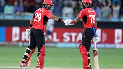 Dubai, United Arab Emirates - September 18, 2018: Nizakat Khan and Anshuman Rath (L) of Hong Kong bats during the game between India and Hong Kong in the Asia cup. Tuesday, September 18th, 2018 at Sports City, Dubai. Chris Whiteoak / The National