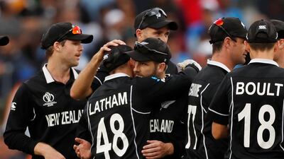 New Zealand's Kane Williamson and Lockie Ferguson celebrate. Reuters