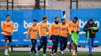 Barcelona's players take part in a training session on the eve of the La Liga match against Real Madrid. AFP