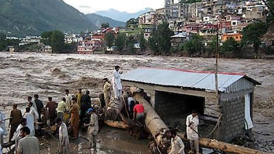 A view of flash floods triggered by heavy monsoon rains in the Neelum river in Pakistani-administered Kashmir yesterday.