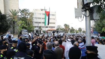 A small group of Jordanians protest against the French caricatures of Muslim's Prophet Muhammad in the area of the French embassy in Amman, Jordan. EPA