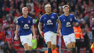Everton's Phil Jagielka celebrates his equalising goal in a 1-1 draw with Liverpool on Saturday in the Premier League. Alex Livesey / Getty Images / September 27, 2014