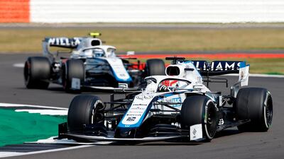 Williams' British driver George Russell, right, leads his teammate Nicholas Latifi at the 70th Anniversary Grand Prix at Silverstone on August 9. AFP