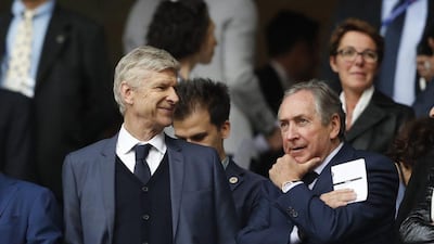 Gerard Houllier alongside then Arsenal manager Arsene Wenger. Reuters