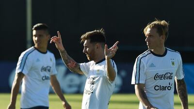 Lionel Messi, centre, trains with the Argentina national team at the San Jose State University. Mark Ralston / AFP