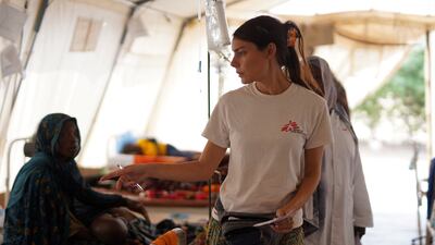 A member of Doctors Without Borders (MSF) counts injured displaced people. Reuters