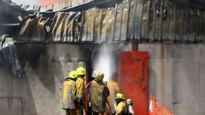 Firemen tackle a raging fire at a warehouse in Al Quoz in April, 2008.