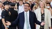 Andy Burnham celebrates after his swearing-in as MP at the Houses of Parliament in June 2026. All photos: Getty Images