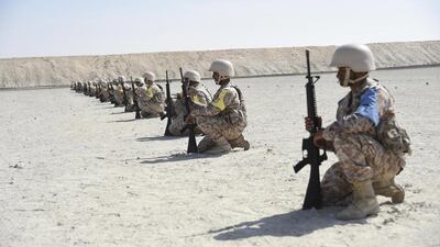 The national service recruits perform in a military training exercise. Courtesy Wam
