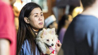 A pet owner with her dog.