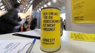 An Amnesty International stand at the Frankfurt Book Fair calls attention to the case of Chinese dissident writer Liao Yiwu, who could not attend because he was denied a passport.