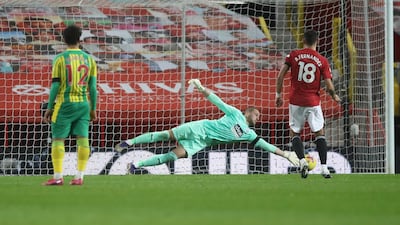 Bruno Fernandes misses with his first penalty, before getting a second attempt from VAR. EPA