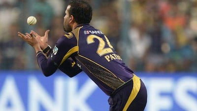 Kolkata Knight Riders cricketer Yusuf Pathan takes the catch off Delhi Daredevils’ Quinton de Kock during the 2016 Indian Premier League (IPL) Twenty20 cricket match between Kolkata Knight Riders and Delhi Daredevils at the Eden Gardens Cricket Stadium in Kolkata on April 10, 2016. AFP / Dibyangshu SARKAR