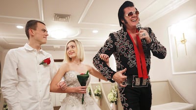 Elvis impersonator Brendan Paul sings during a ceremony at the Graceland Wedding Chapel in Las Vegas, Nevada. Getty Images