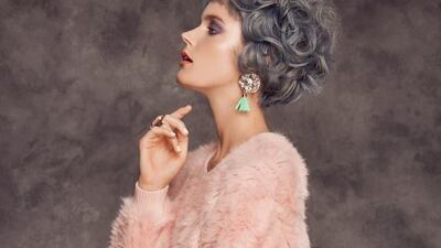 PROUD IN PINK Jumper, Opening Ceremony at Symphony. Skirt, DSquared2 at Saks Fifth Avenue. Earrings, Vanina; ring, Philippe Ferrandis, all at Bloomingdale's.