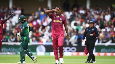 Oshane Thomas of West Indies celebrates getting Mohammad Hafeez of Pakistan out . Getty