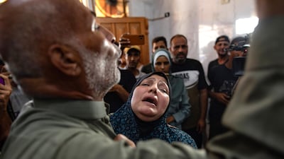 Palestinians mourn at Nasser Hospital following an Israeli strike in Al Mawasi, west of Khan Younis, in the southern Gaza Strip, on August 7, 2024. EPA