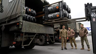 Ukrainian servicemen load a truck with the FGM-148 Javelin, an American man-portable anti-tank missile provided by US to Ukraine as part of continued military support, in Kyiv, Ukraine. AFP