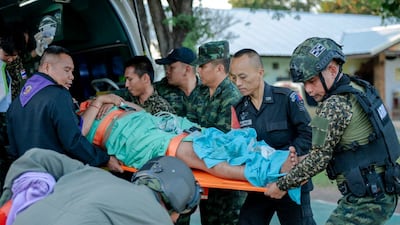An injured soldier is transferred to a hospital in Thailand's Sisaket province on Sunday following a clash between Thai and Cambodian troops. Reuters