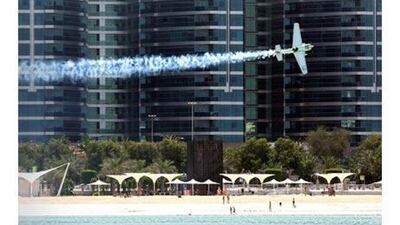 Top, a Red Bull pilot practises on Wednesday.
