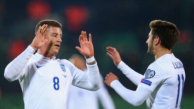 Ross Barkley of England celebrates with Adam Lallana after scoring the team’s first goal against Lithuania on Monday night. Alex Livesey / Getty Images