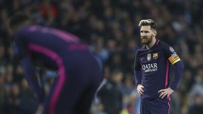 Lionel Messi awaits play to restart after Ilkay Gundogan’s goal gave Manchester City a 3-1 lead. Dave Thompson / AP Photo