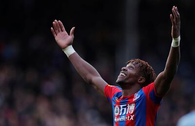 Wilfried Zaha celebrates scoring Crystal Palace's equaliser. Eddie Keogh / Reuters