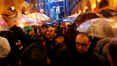 Lebanese celebrate the new year in downtown Beirut. Young Lebanese are increasingly looking for political and economic reform. Jamal Saidi / Reuters