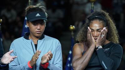US Open Womens Single champion Naomi Osaka of Japan with Serena Williams after their tense match. Timothy A Clary / AFP