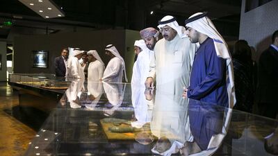 Visitor admire the objects on display at the newly opened ‘Miraj - The Museum’. Silvia Razgova / The National