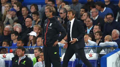 Antonio Conte, manager of Chelsea, right, and Liverpool counterpart Jurgen Klopp during the Premier League match at Stamford Bridge on September 16, 2016 in London, England. Clive Rose / Getty Images