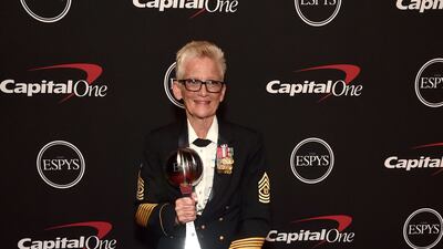 Gretchen Evans poses with the Pat Tillman Award for Service. Getty Images