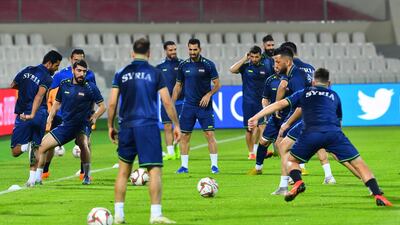 Syria's national team attends a training session at Sharjah Stadium. AFP
