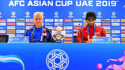 Syria's German coach Bernd Stange, left, and forward Omar Al Soma attend a press conference at Sharjah Stadium in on January 5, 2019, a day ahead of his team's match against Palestine in the 2019 Asian Cup. AFP