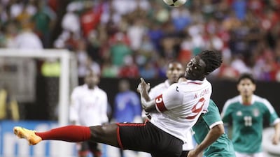 Trinidad & Tobago's Kenwyne Jones, shown here during a Concacaf Gold Cup game in 2013, is set to sign a six-month contract with Al Jazira. REUTERS/Tami Chappell