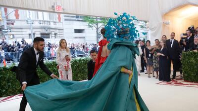 Her dress and cape - Valentino. Reuters