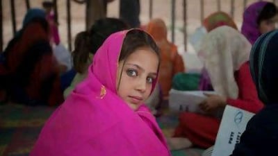 Students at Pehli Kiran School 7 at the Royal Colony settlement near Islamabad. Girls make up half the pupils in some classes, with the school's closeness to the village encouraging families to let them attend. Courtesy Rebecca Conway