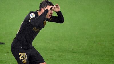 Barcelona's Spanish defender Sergi Roberto celebrates after scoring his side's third goal. AFP