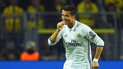 Real Madrid’s Cristiano Ronaldo celebrates after scoring their first goal against Borussia Dortmund. Bernd Thissen / EPA