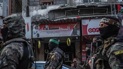 Fighters of Ezz al-Din Al-Qassam brigades, the military wing of Hamas, march in greeting to the Al Qassam commanders in Gaza Basim Issa in Gaza City in Gaza City, Gaza. The ceasefire between Israel and Hamas appeared to be holding, despite fresh clashes at Al-Aqsa Mosque in East Jerusalem. The ceasefire brings to an end eleven days of fighting which killed more than 250 Palestinians, many of them women and children, and 13 Israelis. The conflict began on May 10th after rising tensions in East Jerusalem and clashes at the Al Aqsa Mosque compound. Getty Images