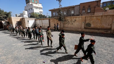 Schoolchildren gather to take a midterm school exam at a public school in Sana'a, Yemen. EPA