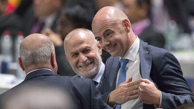 Fifa presidential candidate Gianni Infantino of Switzerland, talks to representatives from national delegations, after the presentation of the results of the first round of voting for a new Fifa President, during the Extraordinary FIFA Congress 2016 in Zurich, Switzerland, Friday, Feb. 26, 2016. (Patrick B. Kraemer/Keystone via AP)