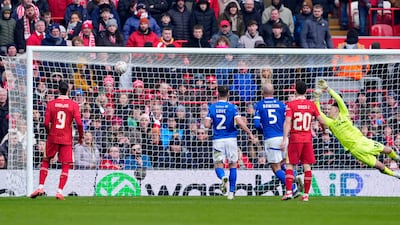 Liverpool's Trent Alexander-Arnold scores at Anfield. PA