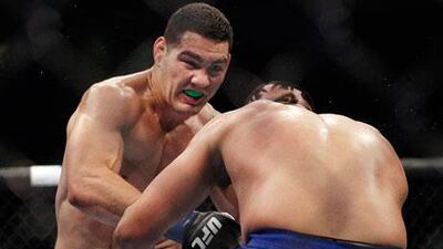 Chris Weidman lands a blow to Mark Munoz during their UFC on Fuel clash